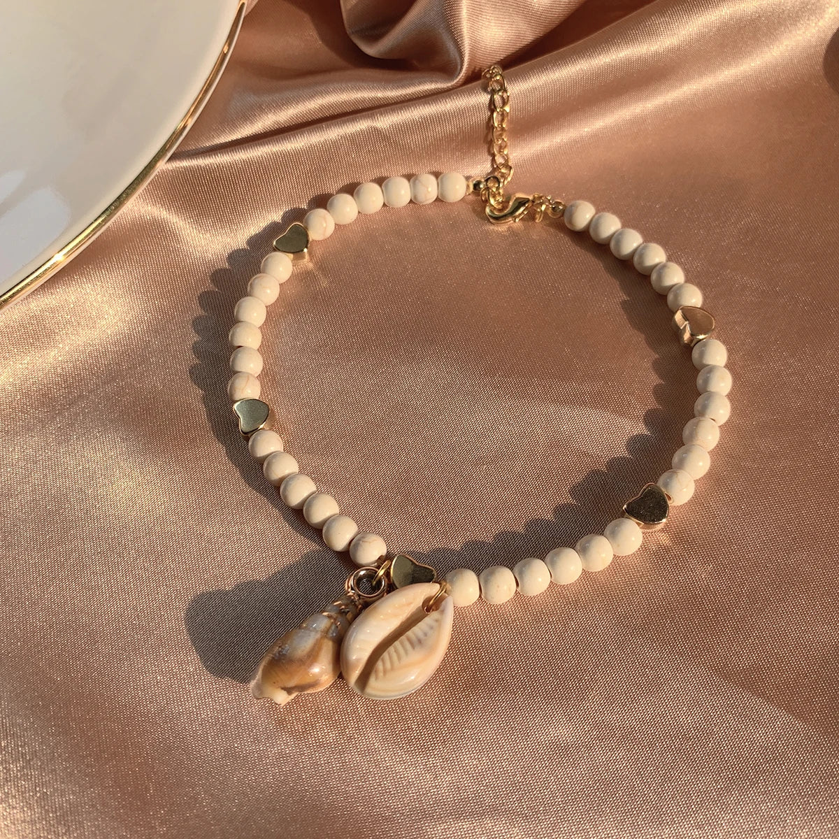White Bead Bracelet with Golden Hearts