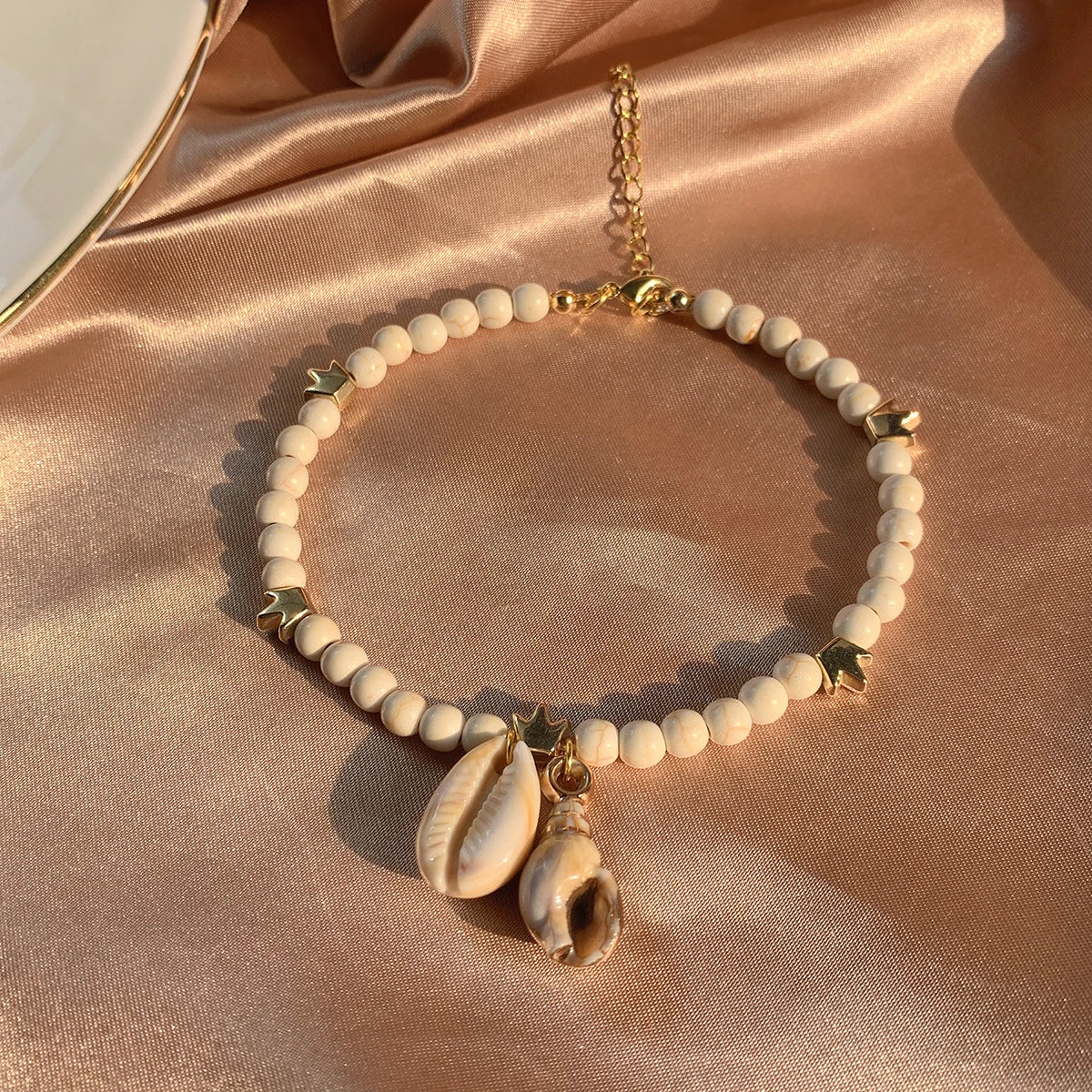 White Bead Bracelet with Golden Hearts