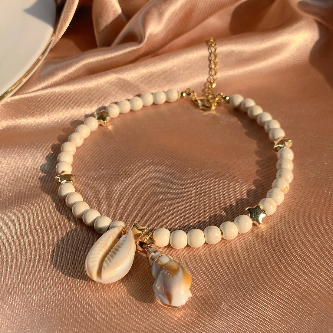 White Bead Bracelet with Golden Hearts